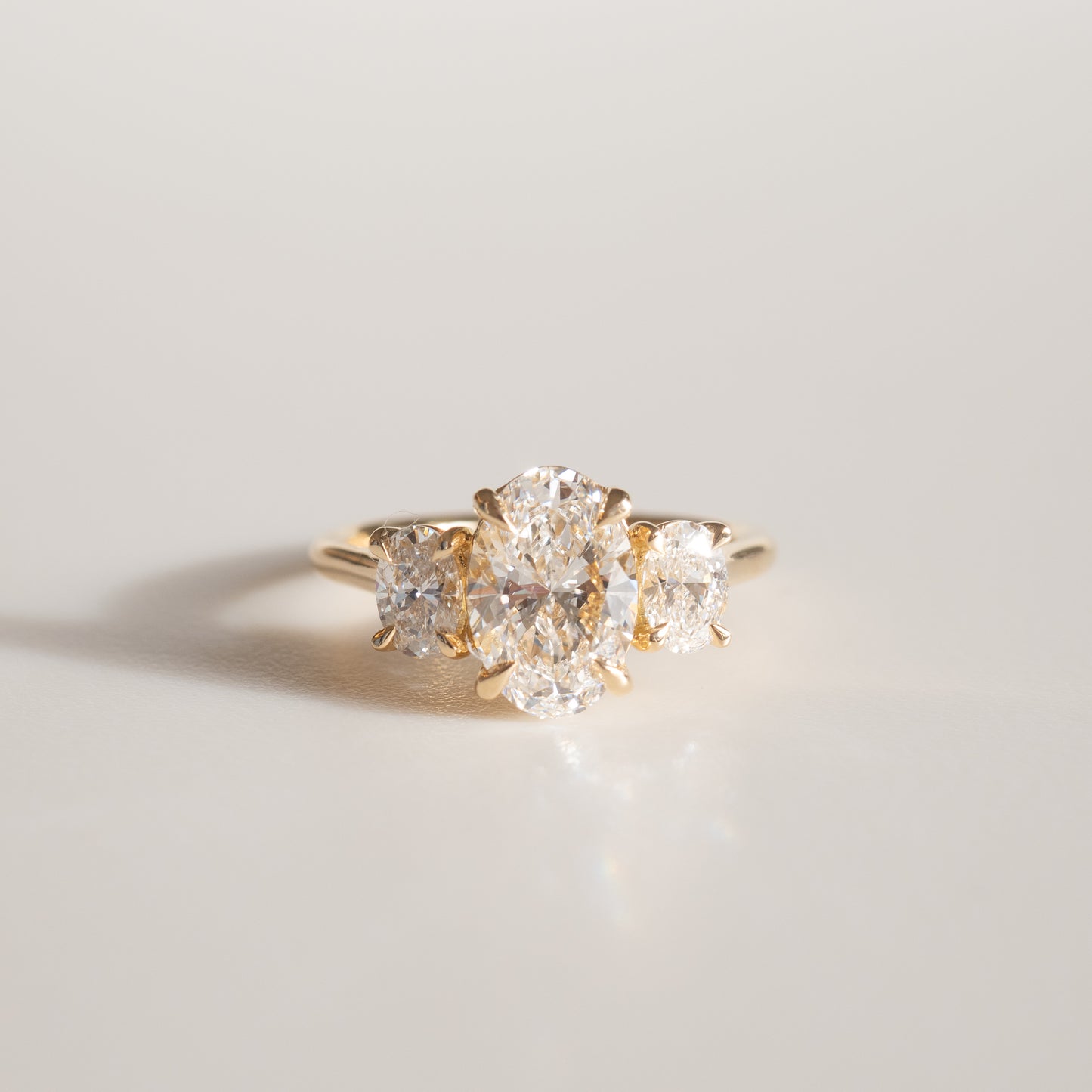 1.5 CT Oval Shaped Three Stone Lab Grown Diamond Engagement Ring