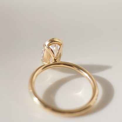 2.02 CT Oval Shaped Half Bezel Lab Grown Diamond Engagement Ring