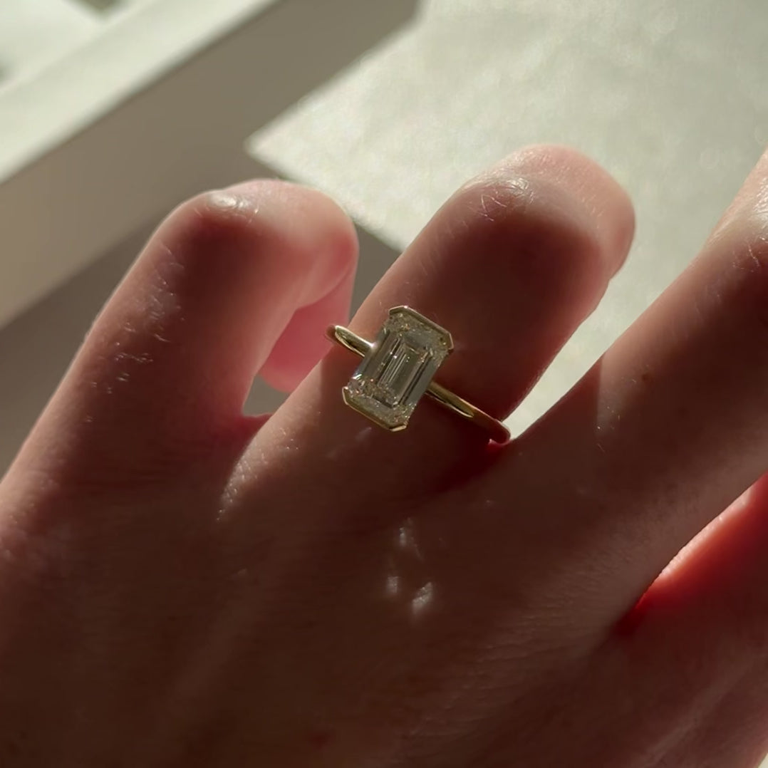 2.11 CT Emerald Shaped Half Bezel Lab Grown Diamond Engagement Ring