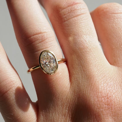 2.01 CT Oval Shaped Bezel Lab Grown Diamond Engagement Ring