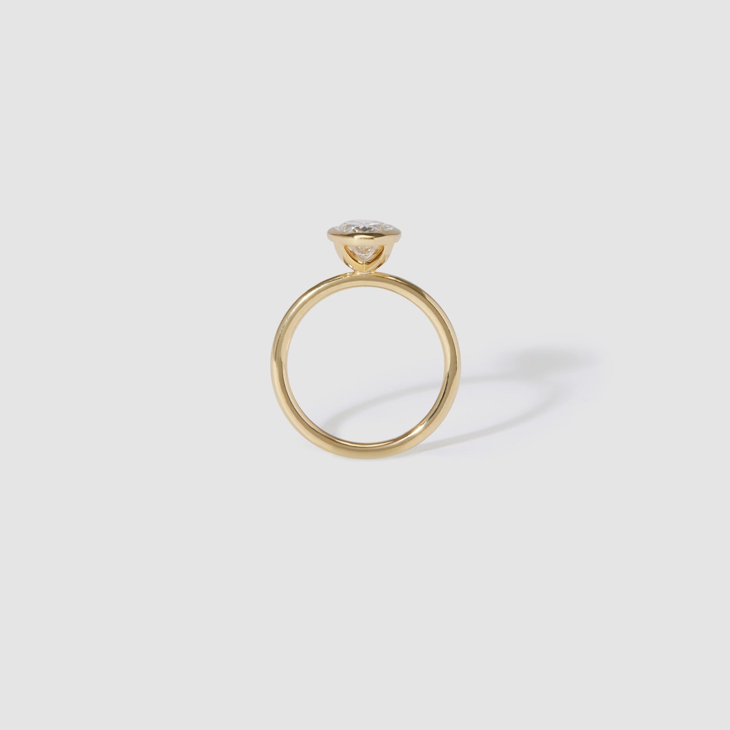 2.01 CT Oval Shaped Bezel Lab Grown Diamond Engagement Ring